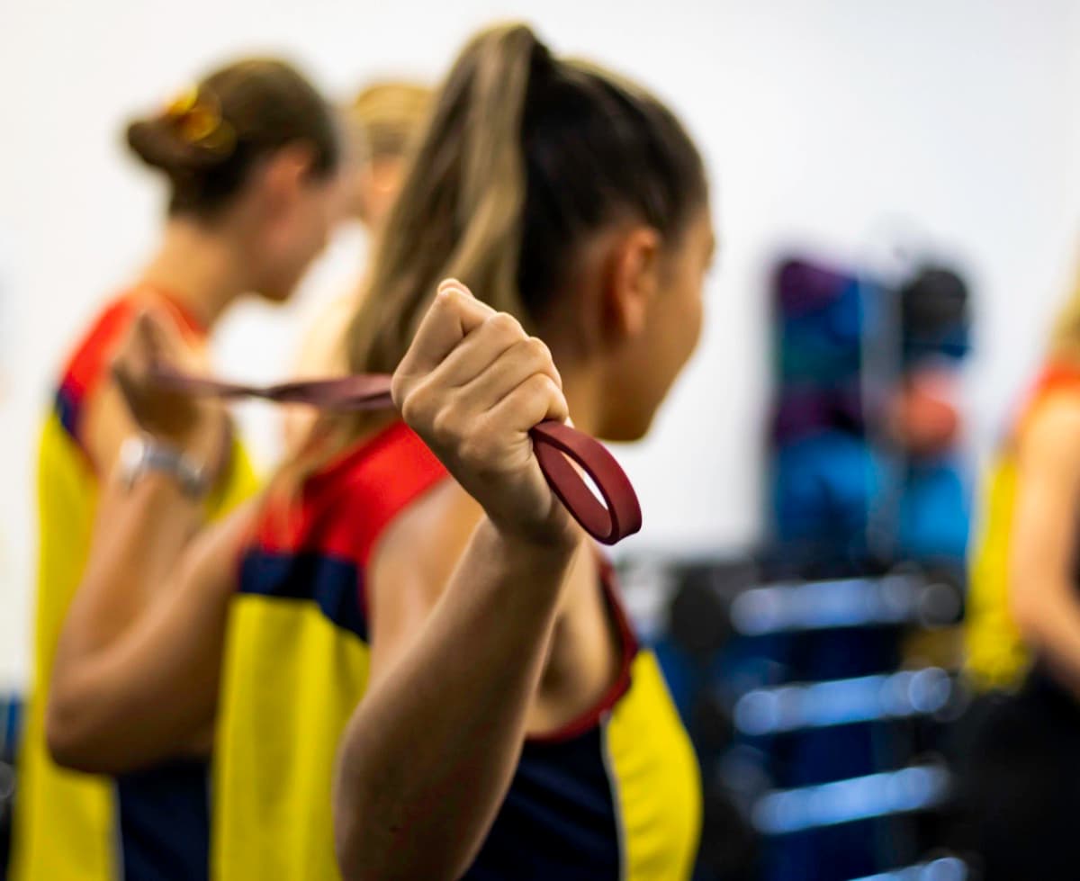 Women training with resistance bands